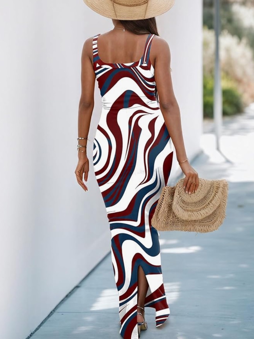 Chic sleeveless maxi dress with a bold white, navy and burgundy swirl print. - Picture 2 of 2